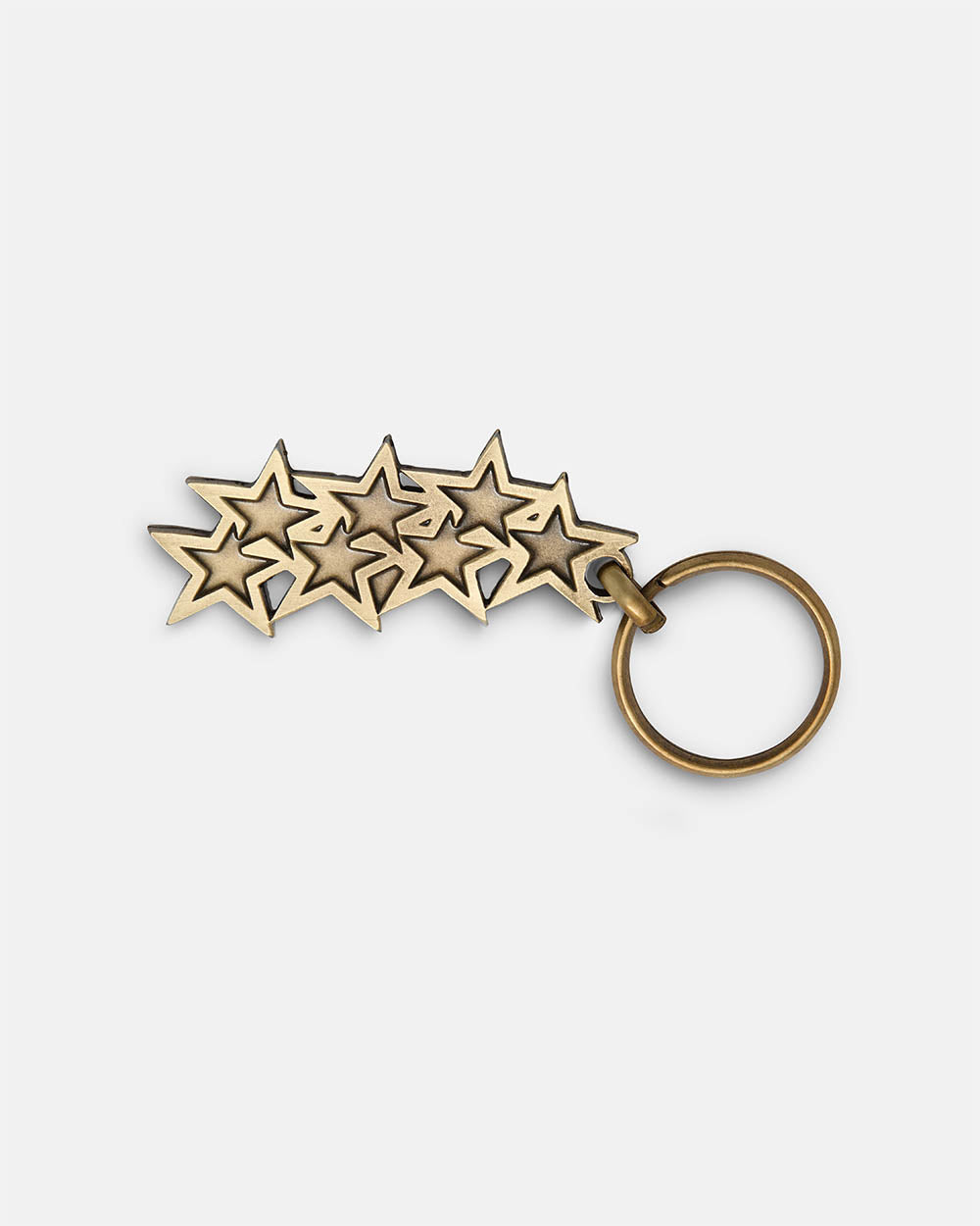 LLAVERO METÁLICO CON LOGO DE ESTRELLAS EN ORO