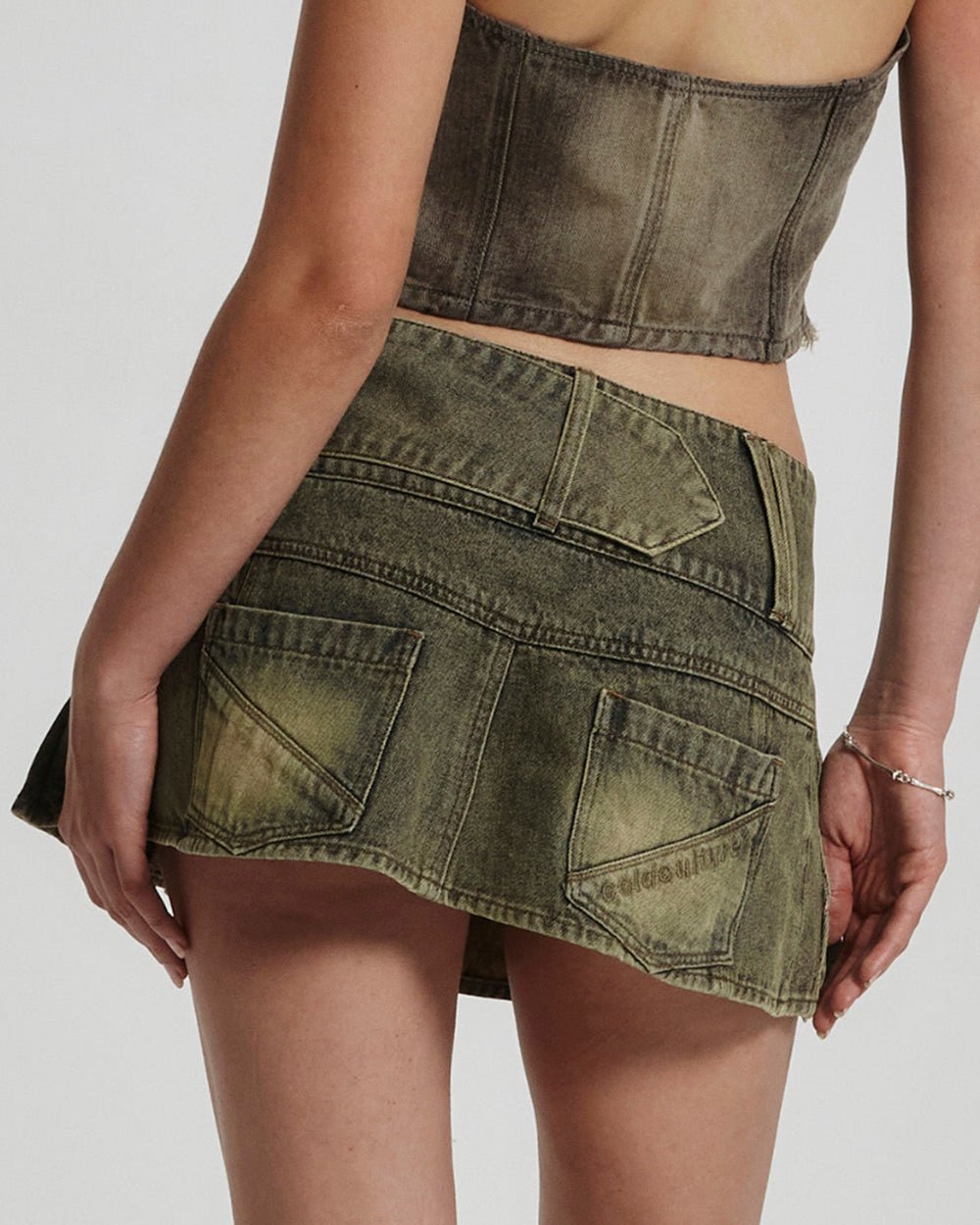 MINI FALDA PLISADA DENIM MARRÓN OSCURO