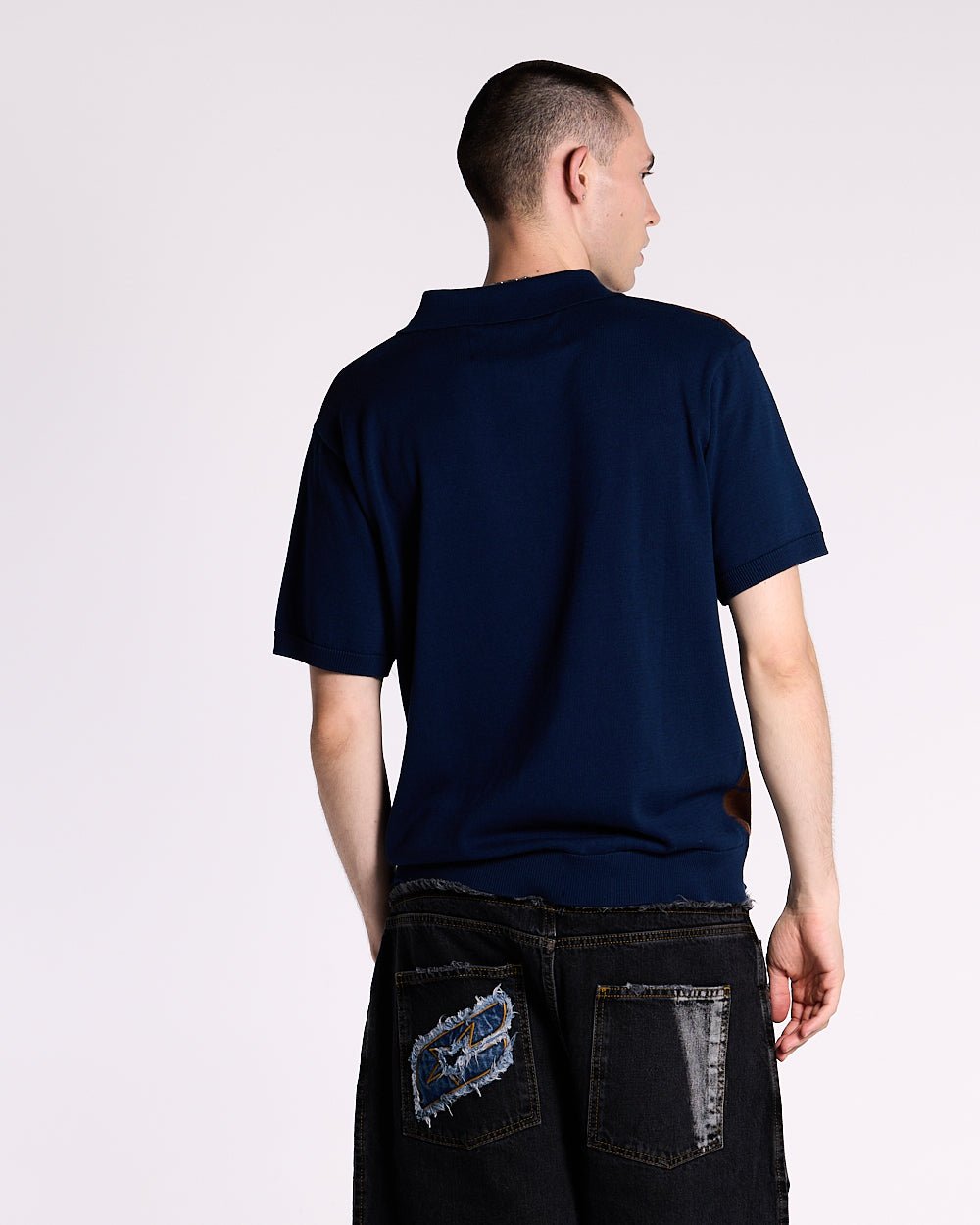 POLERA WINNERS V5 MARRÓN Y AZUL