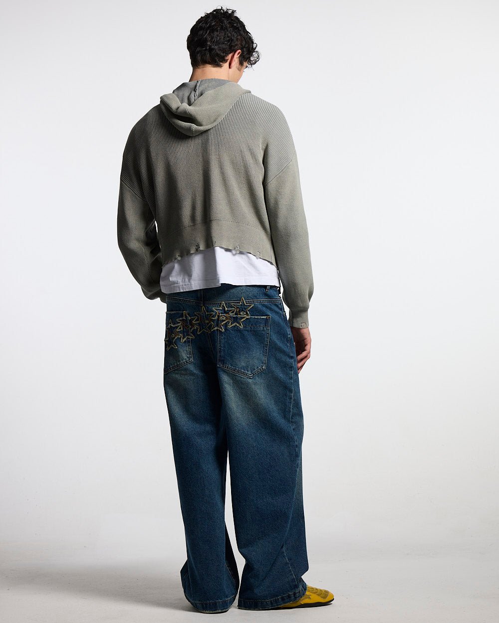 HOODIE DE PUNTO CON CIERRE CURVO GRIS