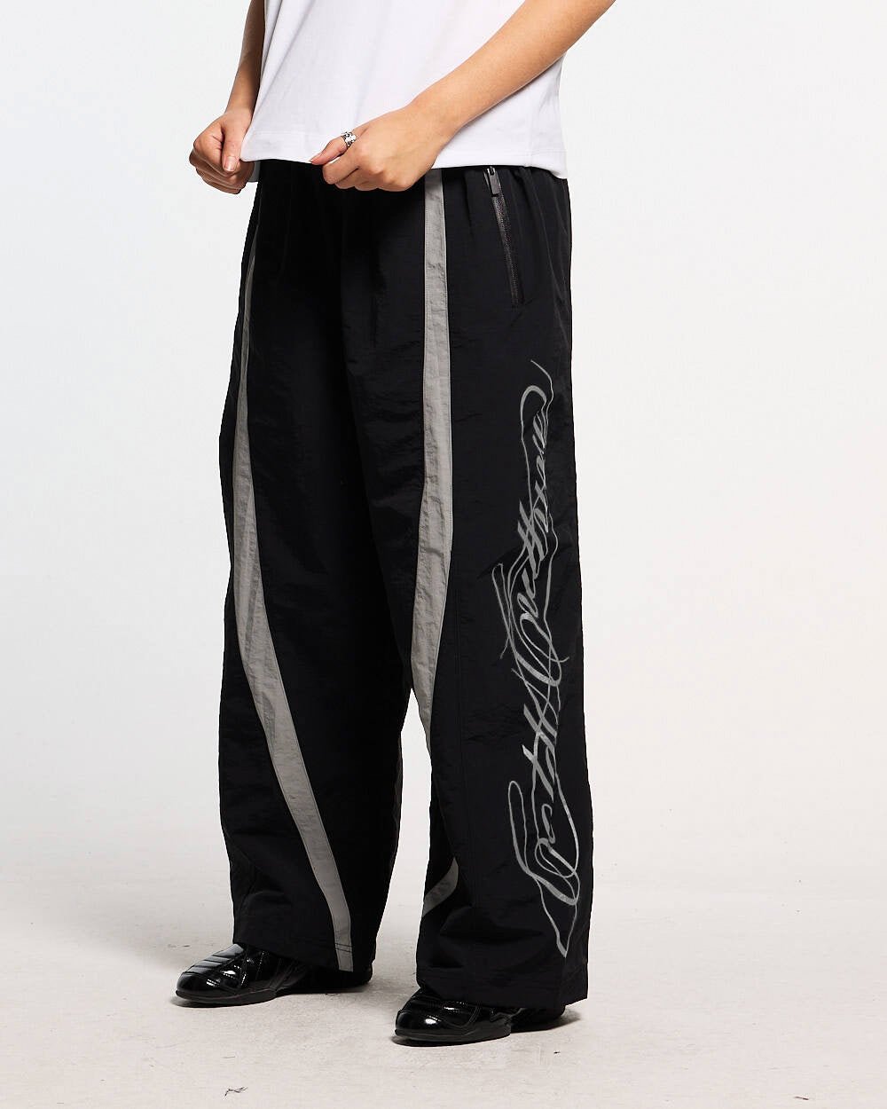 PANTALONES SCRIPT TECH NEGRO